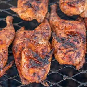 A picture of Chiavetta's chicken cooking on the grill